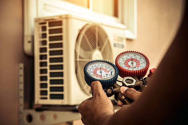 Professional Air Conditioning Service technician working in Bainbridge Island, WA